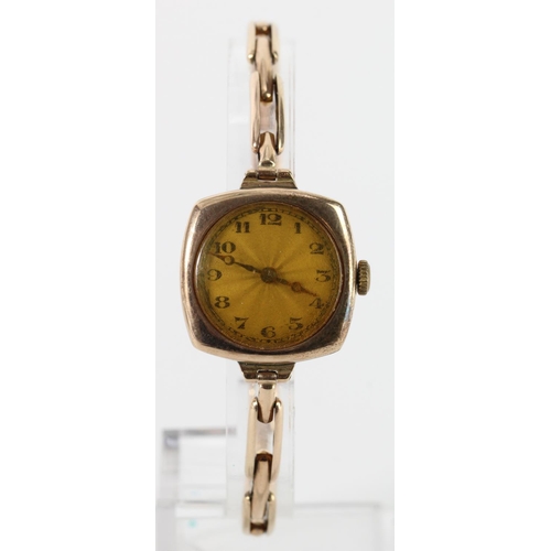 665 - Ladies 9ct cased manual wind wristwatch on a 9ct expandable strap, working when catalogued