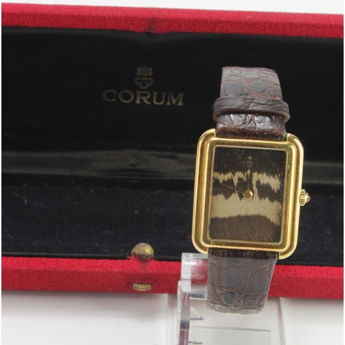 666 - Mid-size 18ct cased wristwatch by Corum. On its original strap, Watch working when catalogued