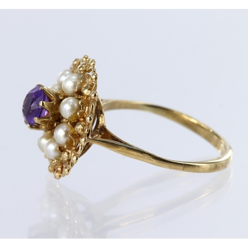 67 - 9ct yellow gold dress ring set with a central round amethyst measuring approx. 5mm diameter, surroun... 