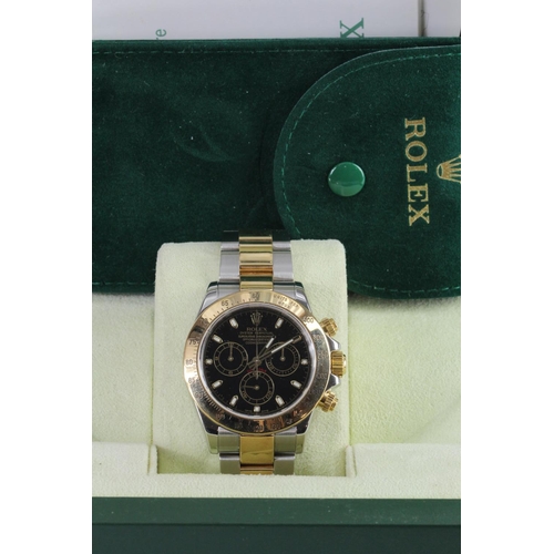 681 - Gents Rolex Daytona circa 2006. with black dial, gold bezel and bi-metallic oyster bracelet. Complet... 