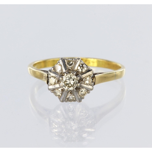 85 - 18ct yellow and white gold cluster ring set with a central round brilliant cut diamond weighing appr... 