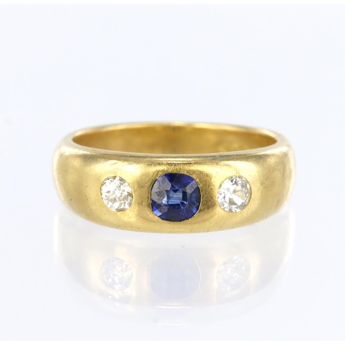 96 - 18ct yellow gold band ring flush set with a central cushion cut sapphire measuring approx. 4.5mm x 4... 