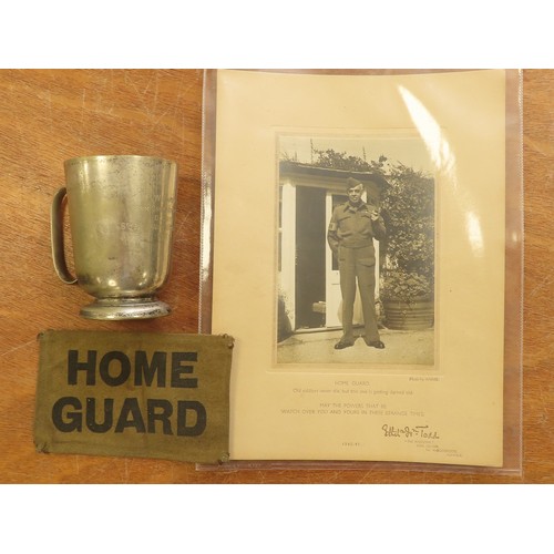 2437 - Home Guard WW2 interest consisting of original Home Guard arm band, portrait of a soldier in the Hom... 