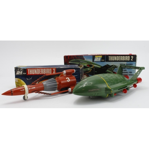 183 - Thunderbirds interest. Two boxed JR 21 Toy Thunderbird models, comprising Thunderbird 2 (includes Th... 