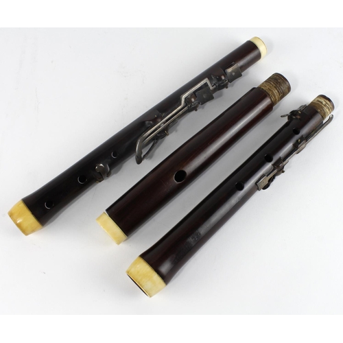 295 - Monzani. A rosewood flute by Monzani, circa mid 19th Century, in need of slight restoration, length ... 