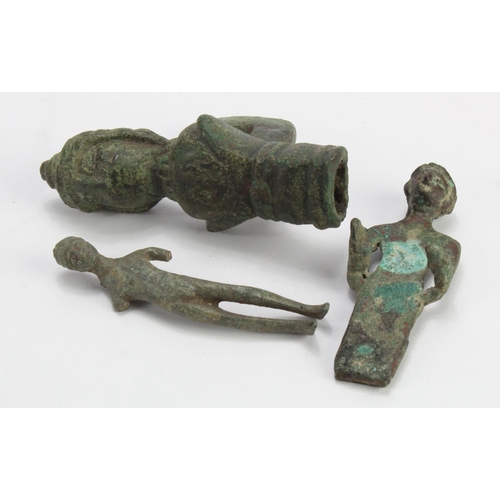 389 - Antiquity. Two ancient bronze figures, length 75mm approx., together with a Roman bronze table pintl... 