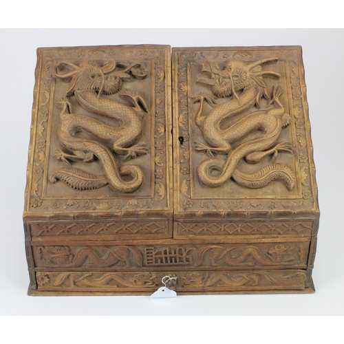 401 - Carved wood stationary box, with Chinese dragon design, height 26cm, width 36.5cm, depth 20cm approx... 