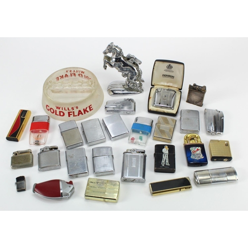 435 - Lighters. A collecton of approximately twenty-five lighters, including Zippo, etc., together with a ... 