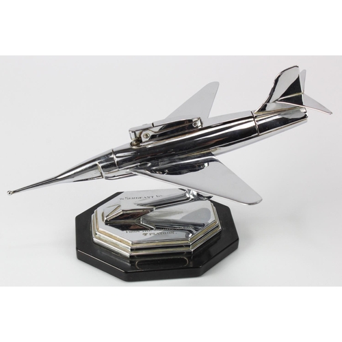 448 - Novelty lighter, depicting a jet plane, engraved to base 'To Sergeant Wilkinson, from the Guardsmen ... 