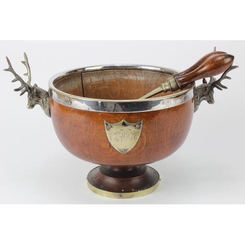 450 - Oak and silver plated bowl on a pedestal base with figural stag handles, circa early 20th Century, e... 