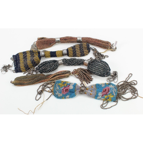 456 - Purses. A group of five cut steel beaded misers purses, circa 19th Century, largest 23cm approx.