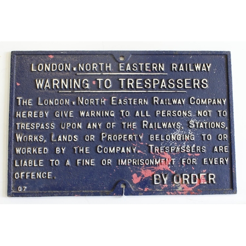 464 - Railway interest. A large cast iron railway trespassers sign, reads 'London North Eastern Railway, W... 