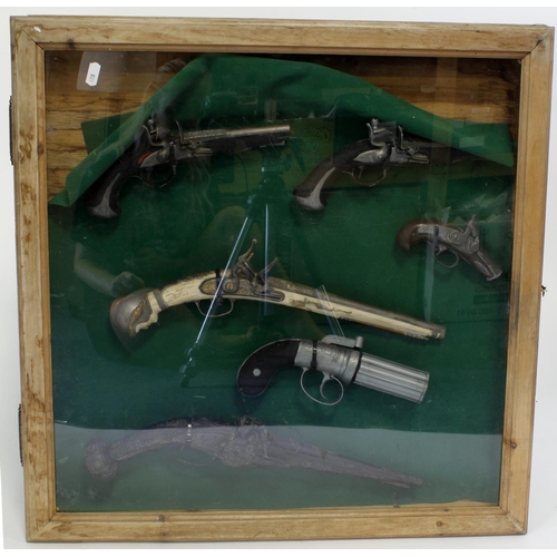 1468 - Flintlock & Early pistol Pub style display case, well executed plastic or resin copies, unusual