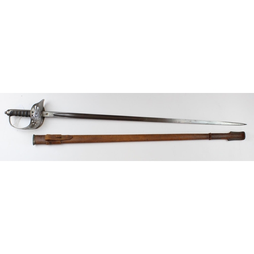 1558 - Sword ERVII 1897 pattern Infantry NCO with a plain blade in its brown leather covered scabbard.