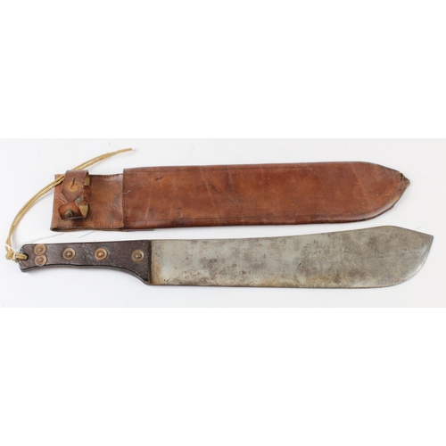 1579 - WW1 machete in its 1917 dated brown leather scabbard.