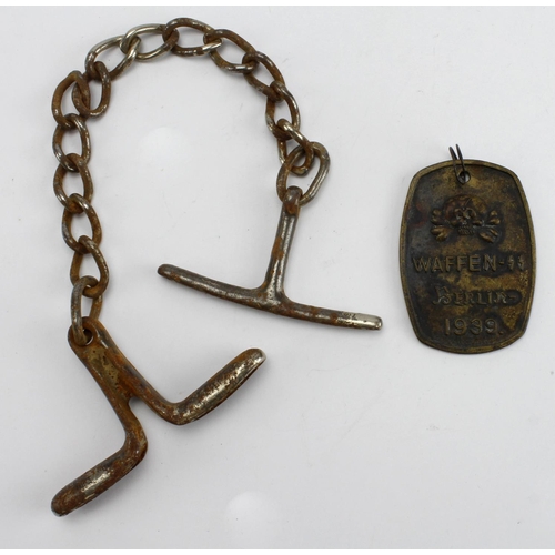 1643 - German Gestapo wrist chains, plus a Waffen SS tag