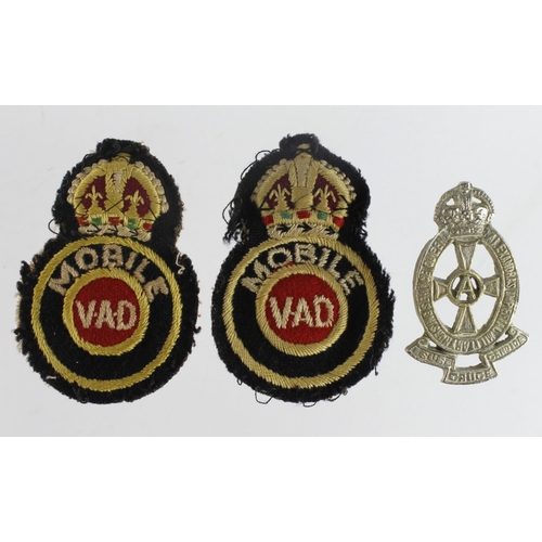 1918 - Badges Medical interest QAIMNS crudely made on campaign cap badge and a pair of Mobile VAD cloth bad... 