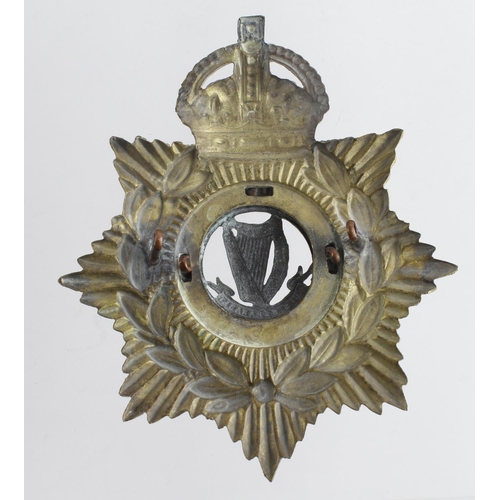 1934 - Blue cloth Helmet plate cap badge Connaught Rangers.