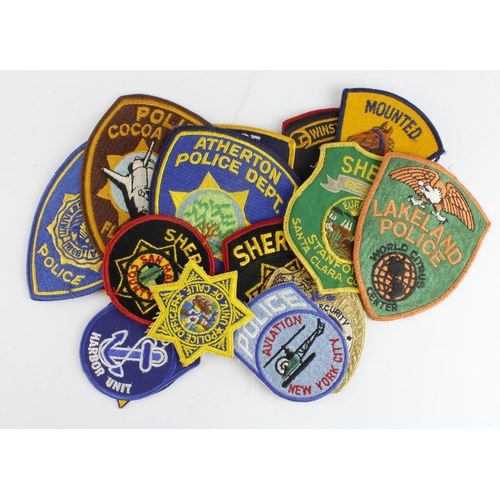 2020 - Collection of cloth United States police badges.