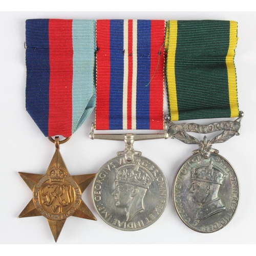 2057 - Group mounted as worn - 1939-45 Star, War Medal, Efficiency Medal GVI with Territorial clasp (439079... 