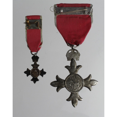 2098 - MBE (Civil) with matching Miniature Medal. Full size medal of grubby appearance due to being lacquer... 