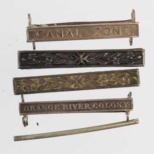 2099 - Medal clasps including QSA Orange River Colony, Canal Zone, Order of St John Long service bars etc.