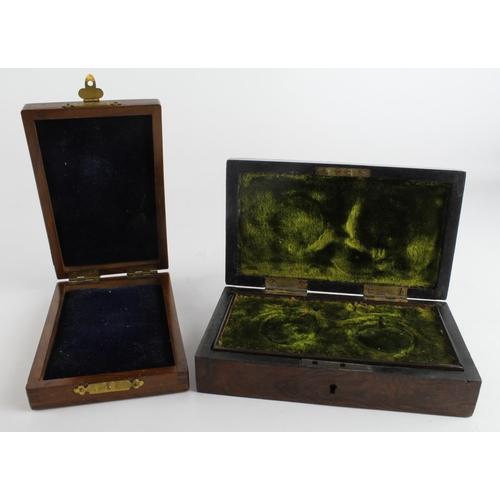 2100 - Medal Containers comprising 2 attractive rectangular wooden boxes, possibly mahogany. They measure 9... 