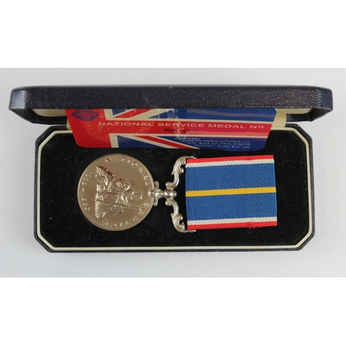 2123 - National Service Medal in fitted case.