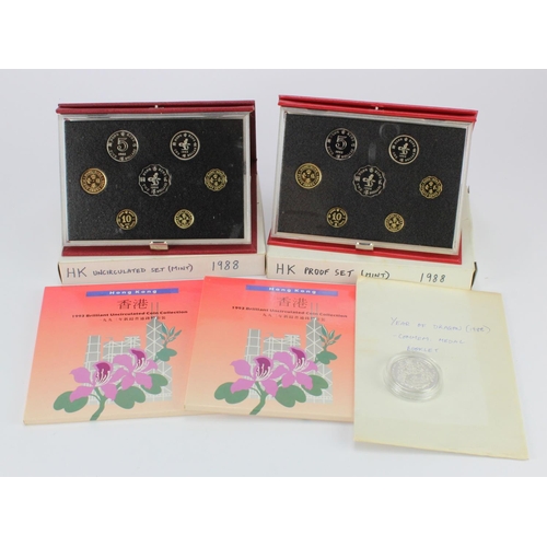 767 - Hong Kong Sets etc (5): 2x 1993 BU sets, 2x 1988 proof sets (one missing cert), and a Year of the Dr... 