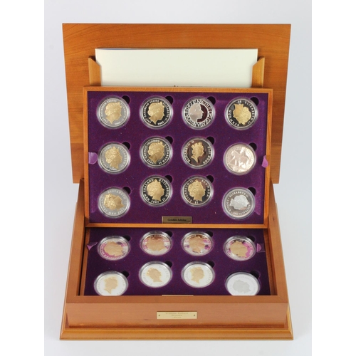 777 - Queen Elizabeth II Golden Jubilee Collection. The 24 coin set of Silver Crown sized coins from aroun... 