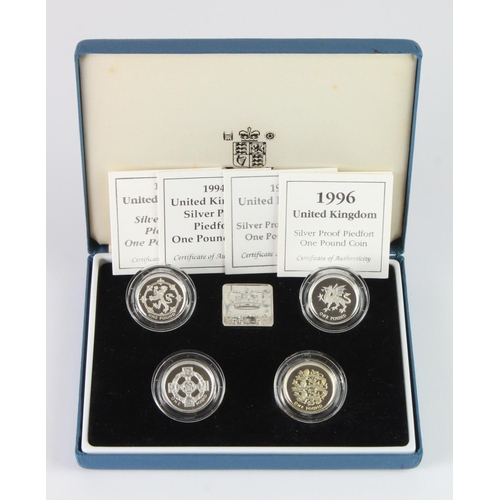 780 - Royal Mint: UK Silver Proof Piedfort £1 four-coin set 1994-1997, aFDC (some toning) cased with certs... 