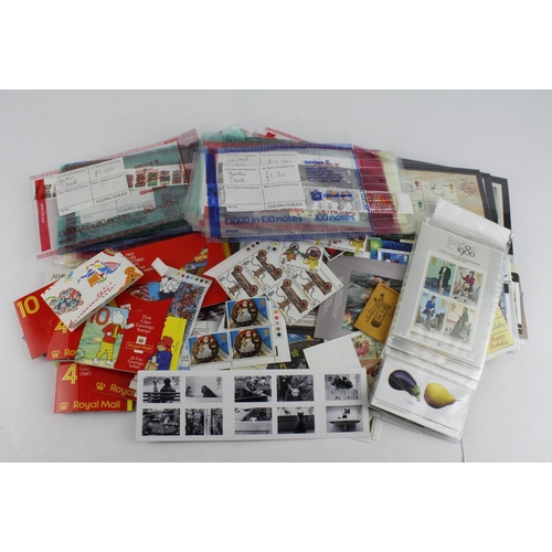 912 - GB - small white box packed with mainly Commemorative issues in packets and loose. Many complete set... 