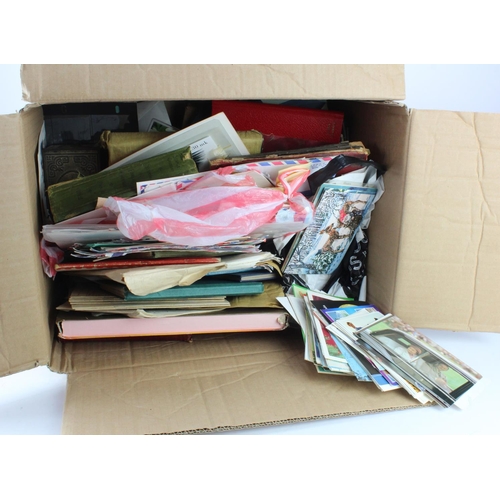 997 - Large box with an untidy mix of foreign stamps, several small albums and stockbooks, unchecked packe... 