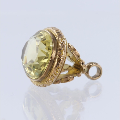 1045 - 9ct yellow gold fob set with an oval faceted citrine measuring approx. 25mm x 20mm, weight 12.4g