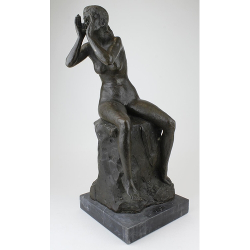 1064 - Bronze figure of a female nude seated on a rock and calling out. On a marble base. Signed. Height me... 