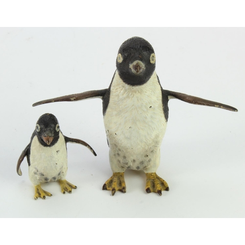 1074 - Cold painted bronzes. Two cold painted bronzes depicting penguins, height 70mm & 38mm approx.