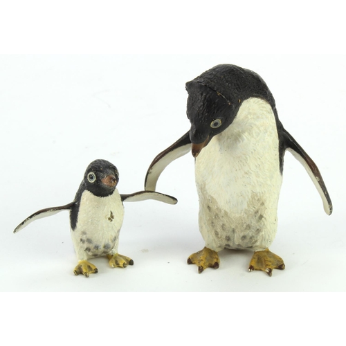 1075 - Cold painted bronzes. Two cold painted bronzes depicting penguins, height 70mm & 38mm approx.