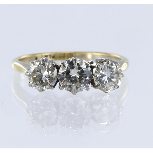 129 - Yellow and white metal stamped '18CT PLAT' diamond trilogy ring, round brilliant cut diamonds approx... 