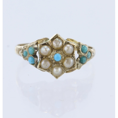 143 - 9ct yellow gold cluster ring set with a central turquoise cabochin measuring approx. 1.5mm diameter,... 