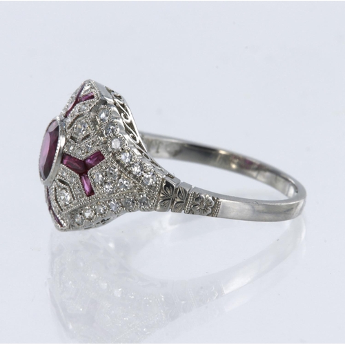 153 - White metal tests platinum ruby and diamond art deco style cluster ring, principle oval mix cut ruby... 