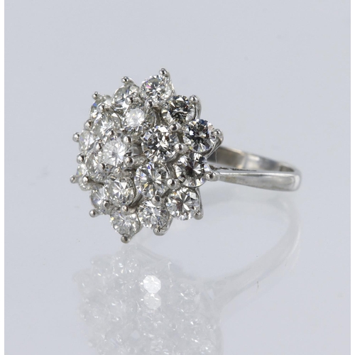 163 - 18ct white gold cluster ring set with nineteen round brilliant cut diamonds with an estimateda total... 