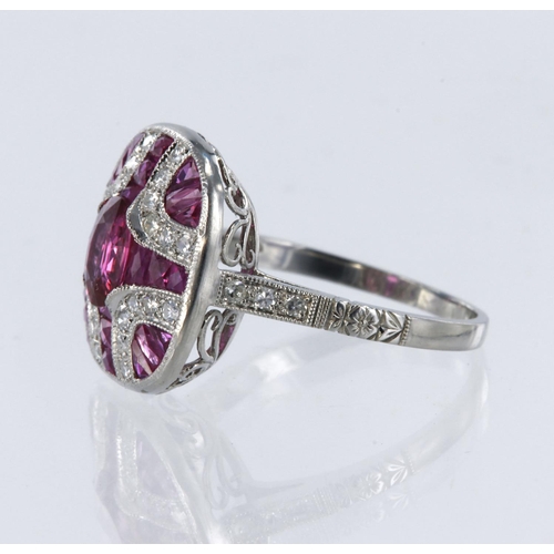 178 - White metal tests platinum ruby and diamond art deco style cluster ring, principle oval mix cut ruby... 