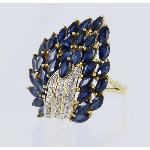 200 - Test 18ct yellow gold cluster ring, set with marquise sapphires, highlighted with diamond points. To... 