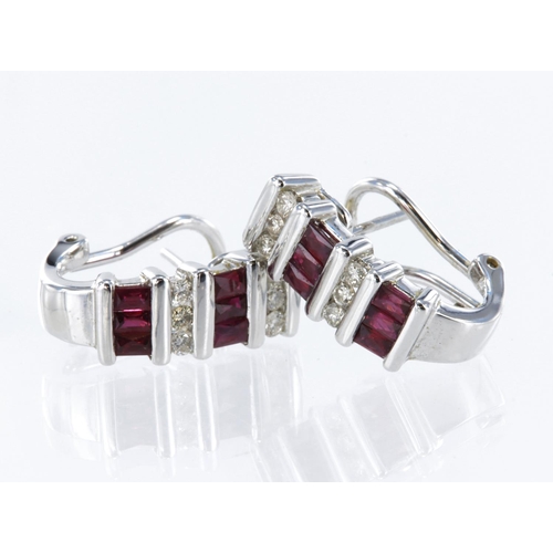 266 - 18ct white gold earrings with post and clip fittings for pierced ears, each set with six rectangular... 