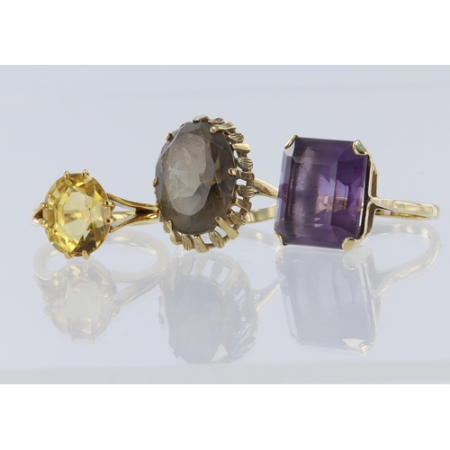 358 - Three quartz cocktail dress rings to include 9ct yellow gold square cut amethyst, stone measures 16m... 