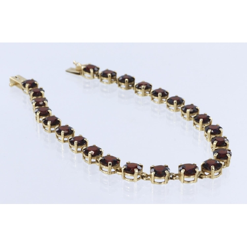 377 - 10kt Gold stamped garnet bracelet, length 19.5cm approx., weight 7g approx.