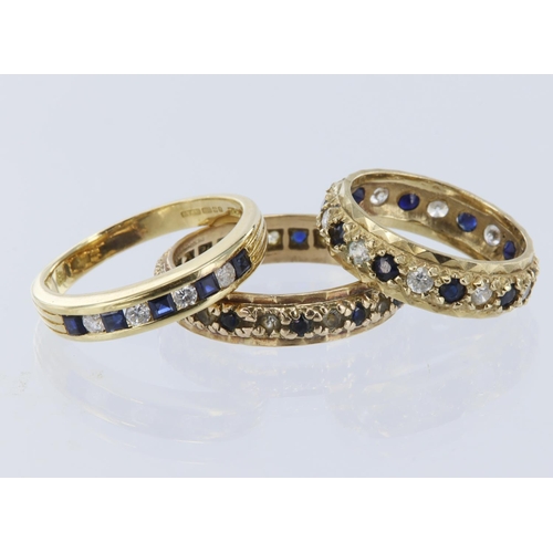 416 - Three rings to include 18ct yellow gold sapphire and CZ half eternity ring, set with five square cut... 