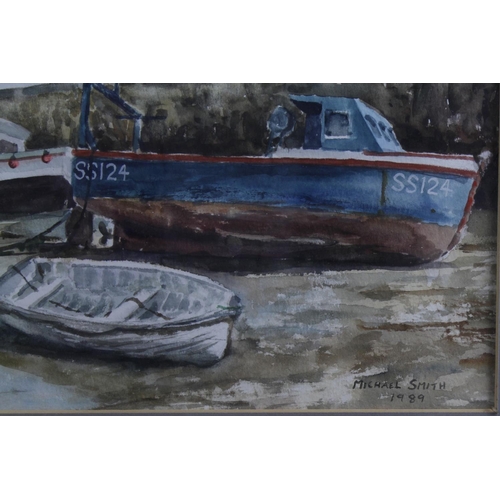 469 - Fishing Boats anchored in harbour at low tide by Michael Smith. Signed and dated 1989. Framed and gl... 