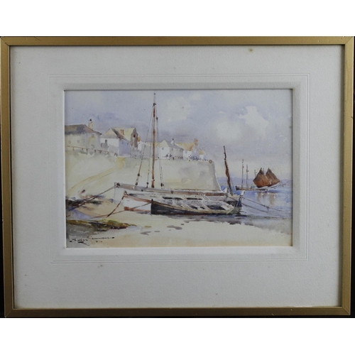 524 - Simmons, Eyres (British 1872-1955) Watercolour depicitin fishing boats on the shore by a seaside tow... 