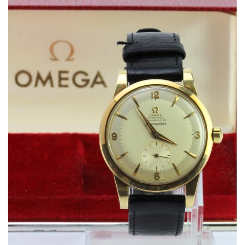 609 - Boxed gents 14ct cased Omega Seamaster automatic wristwatch circa 1950. The two colour cream dial wi... 